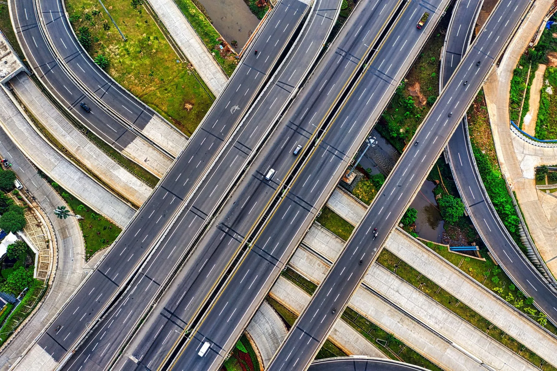 An aerial view of a multi-level highway interchange